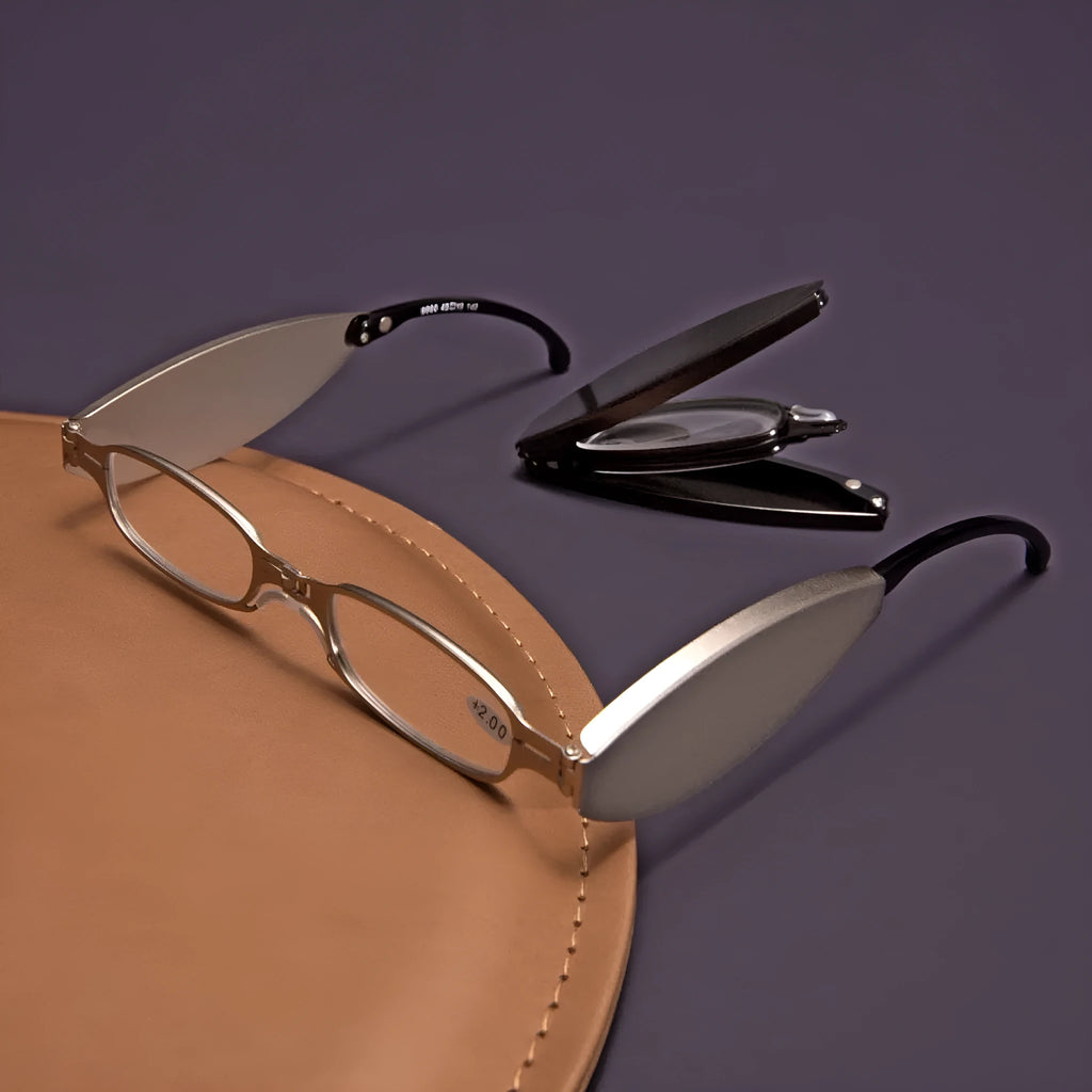 Black retro folding reading glasses with a ring detail, shown in open and closed positions.