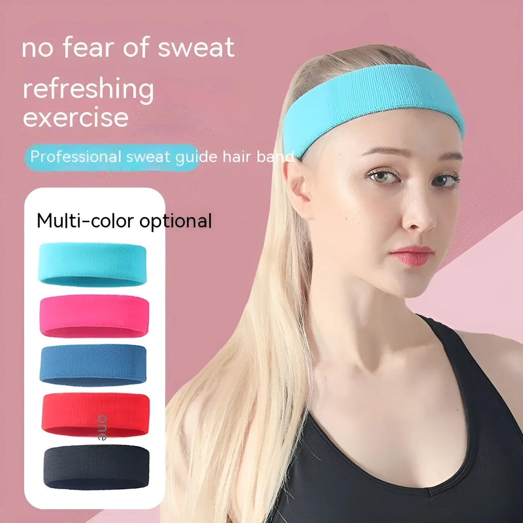 Elastic solid colour sports sweatband in black, shown on a white background.