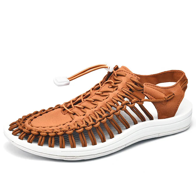 Roman-style woven sandals with drawstring tie closure in artificial PU with rubber soles