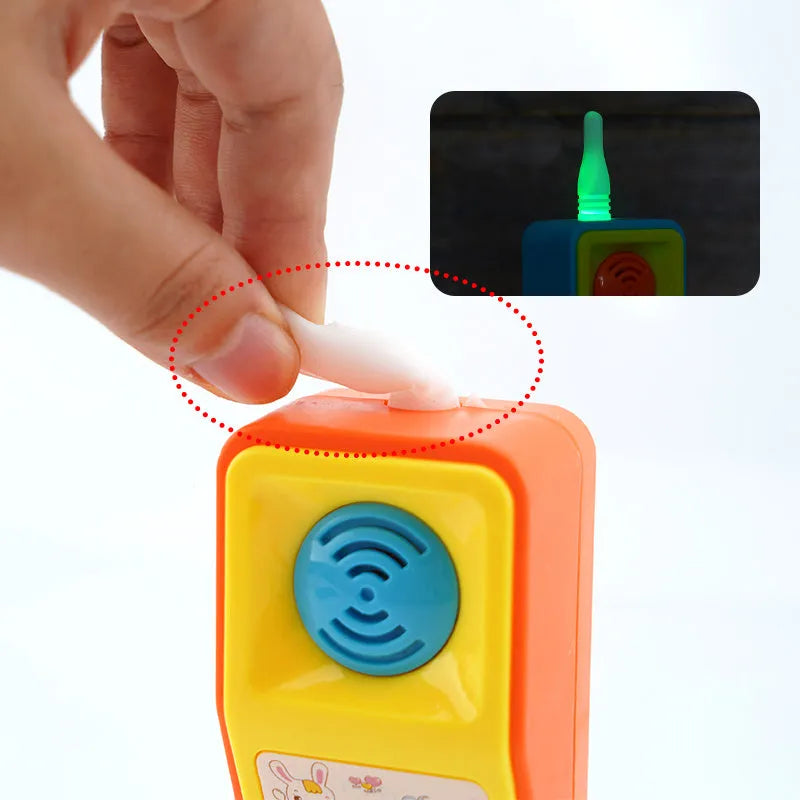 Children's educational toy with sound and light effects featuring cartoon animal design for age 3+