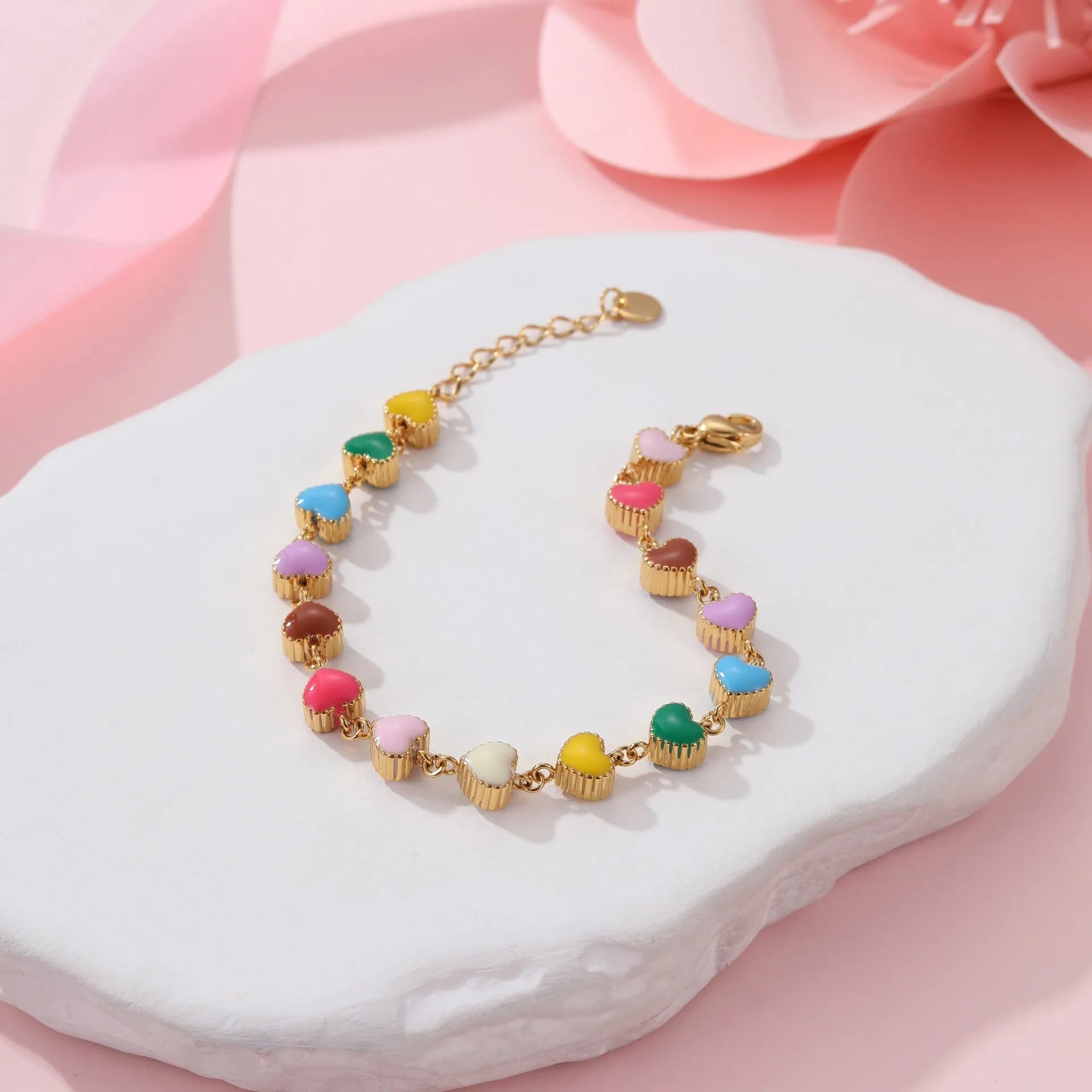 Women's titanium steel bracelet with oil-filled heart pendant in gold or steel finish