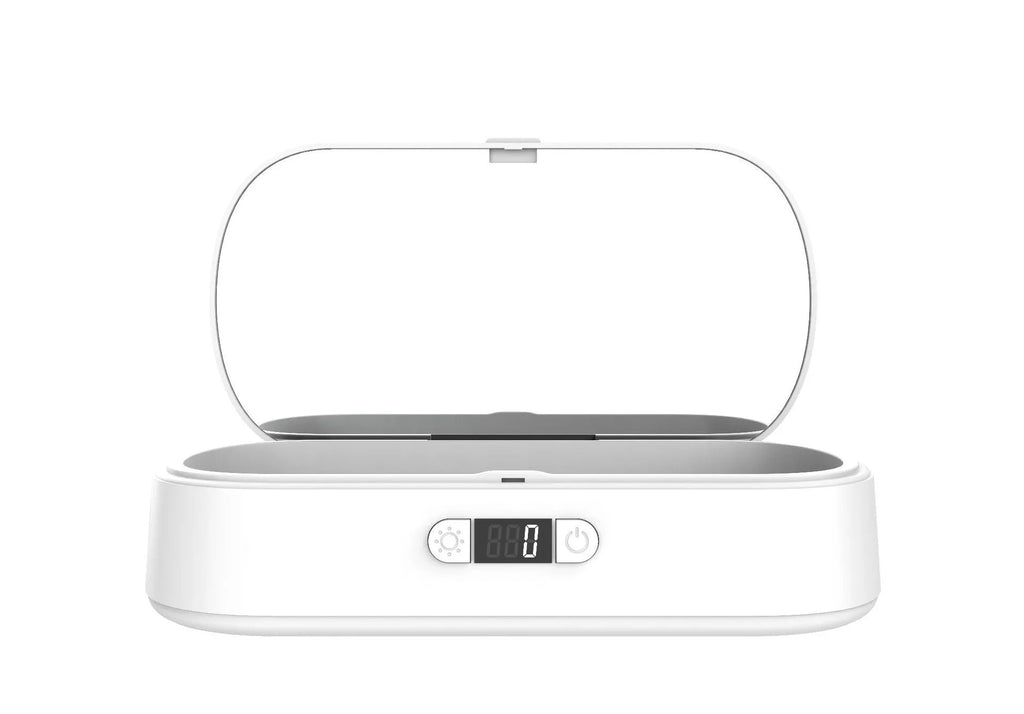 White portable UV steriliser box with wireless charging for phones and toothbrushes