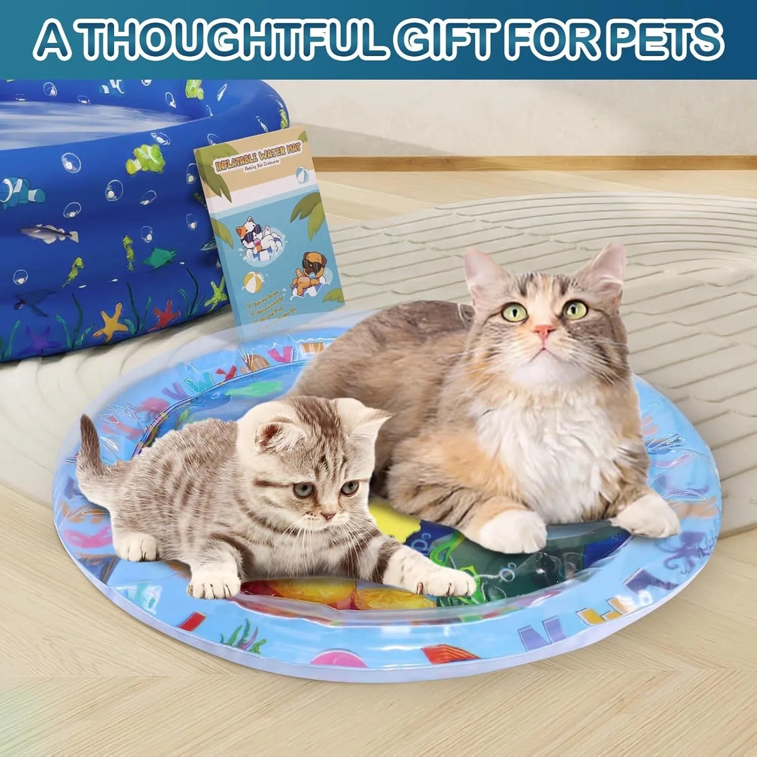 A square, blue water sensory playmat for cats on a floor, showing floating fish toys inside the clear water-filled centre.