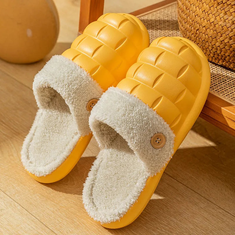 Women's pink and grey plaid detachable slippers with plush lining and a textured non-slip sole.
