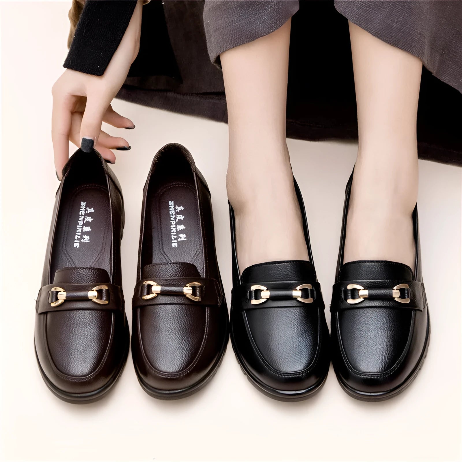 Black flat heel pumps with soft microfiber upper, round toe, and metal accent, low 1-3cm heel