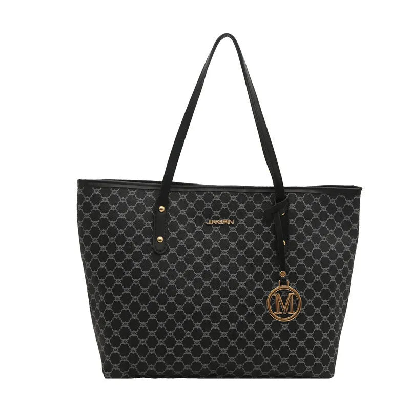 Western style black PU shoulder bag with sewing thread detailing and adjustable strap.