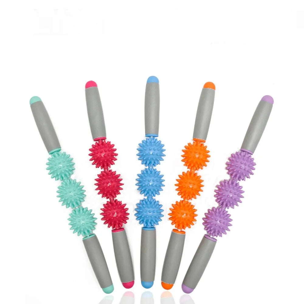 Anti cellulite massager stick with hedgehog-shaped balls and green padded ergonomic handles on a white background