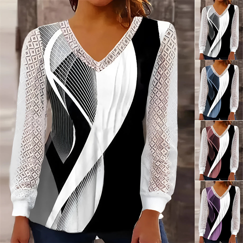 Women's loose purple V-neck pullover top with lace print and long sleeves on a hanger.