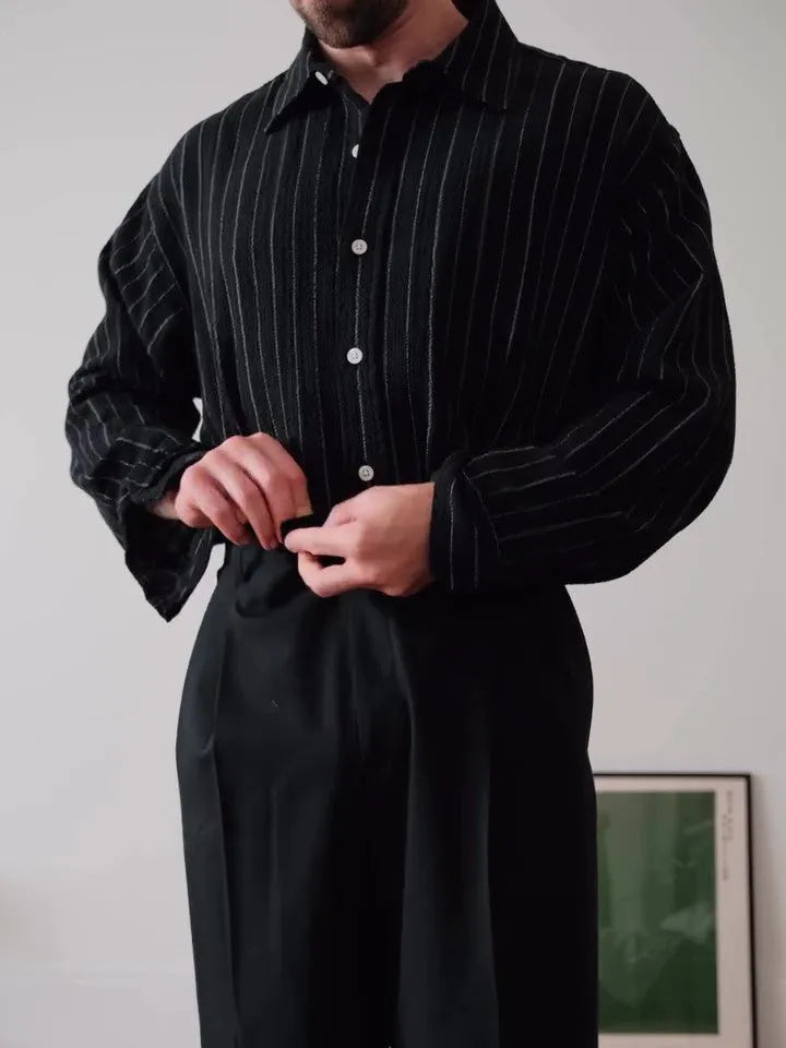 Men's black pinstripe polyester button-down shirt with regular fit on a hanger.