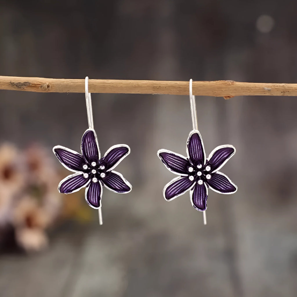 Purple flower-shaped alloy earrings with electroplated finish and retro styling