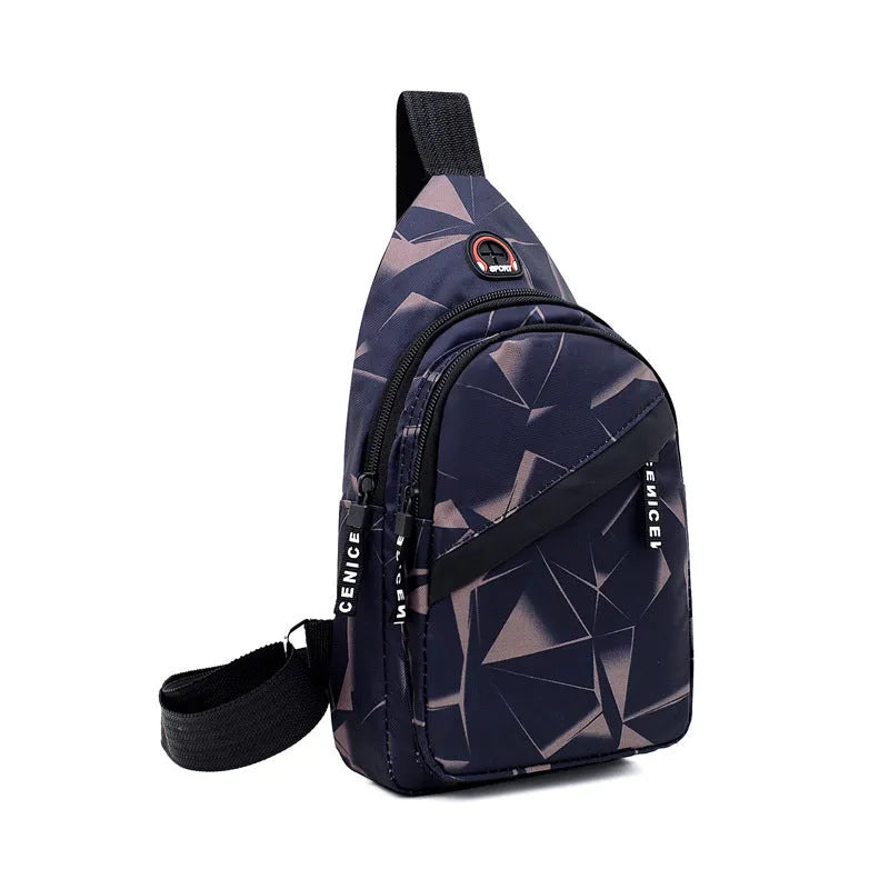 Men's blue Oxford cloth crossbody sling bag with an earphone hole and zipper, shown in a square vertical shape.