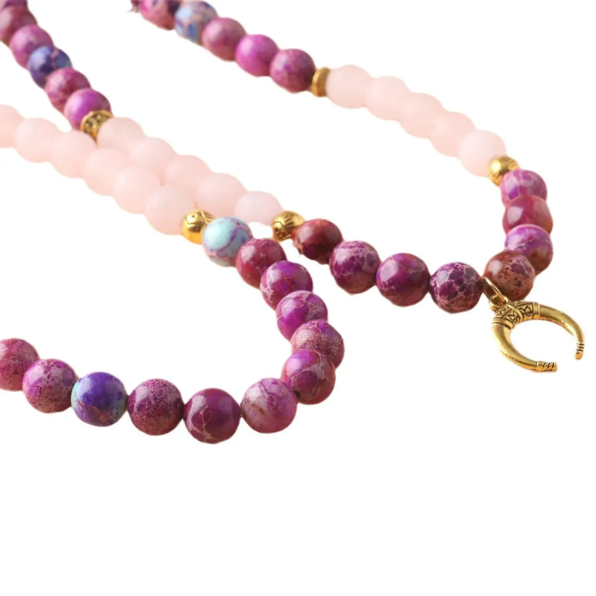 Pink crystal Emperor Stone round pendant necklace on a casual chain