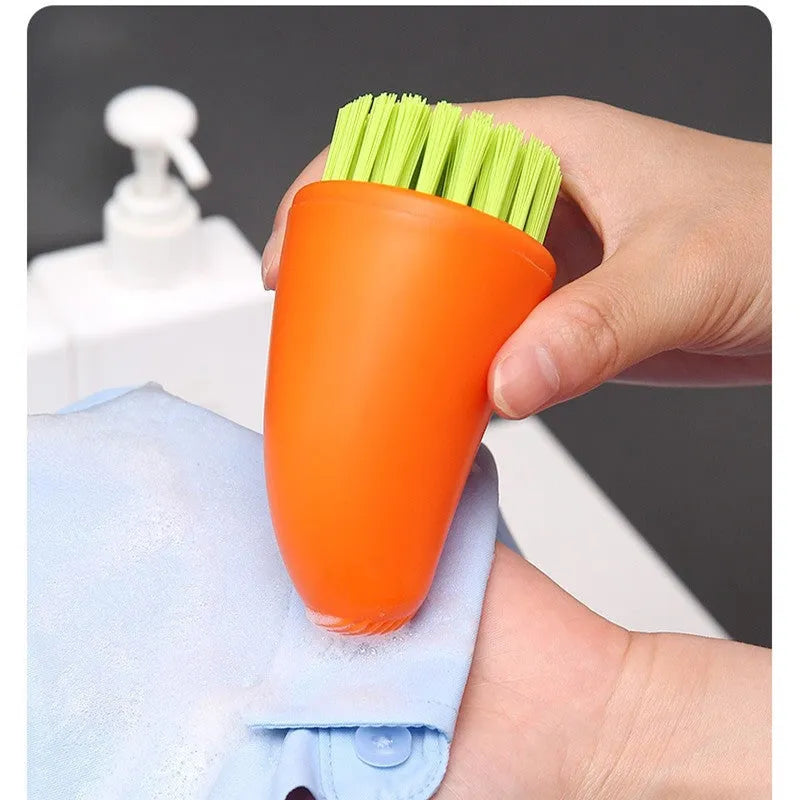 Multifunctional carrot-shaped kitchen brush with nylon bristles in orange and white colours