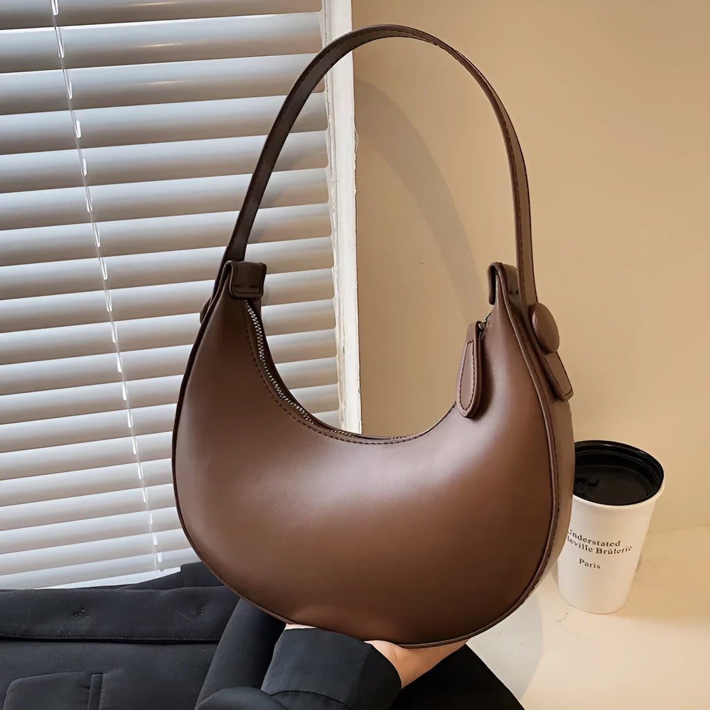 Women's retro dumpling-shaped shoulder bag in PU leather with zipper compartment interior