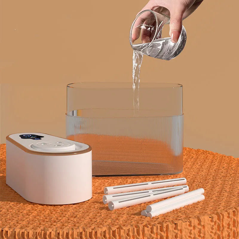 Electric three jet humidifier in blue with USB cable, 1.0-2.5L tank, and atmosphere lamp on a bedroom desktop