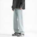 Men's light blue straight leg jeans with button waist and traditional denim styling