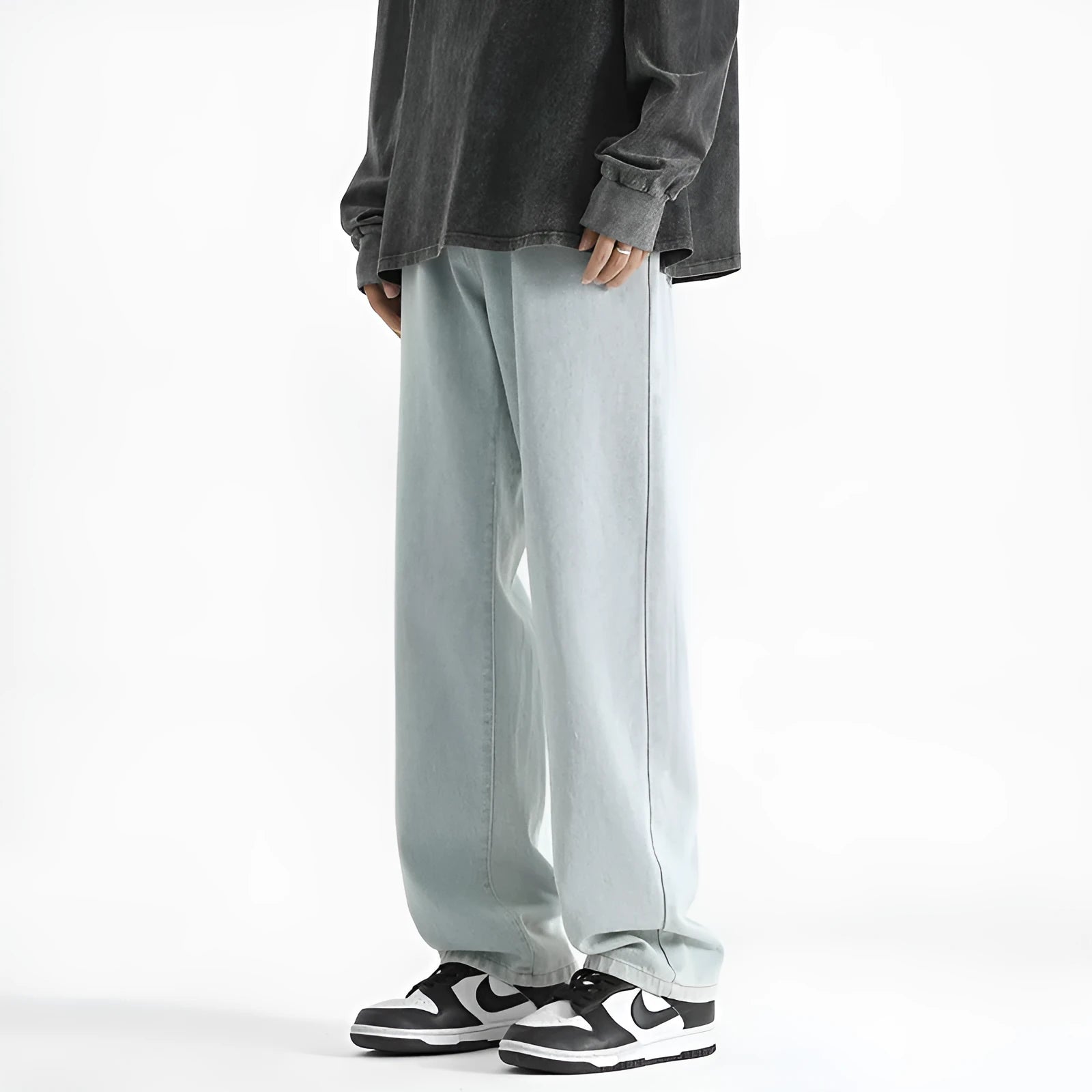 Men's light blue straight leg jeans with button waist and traditional denim styling