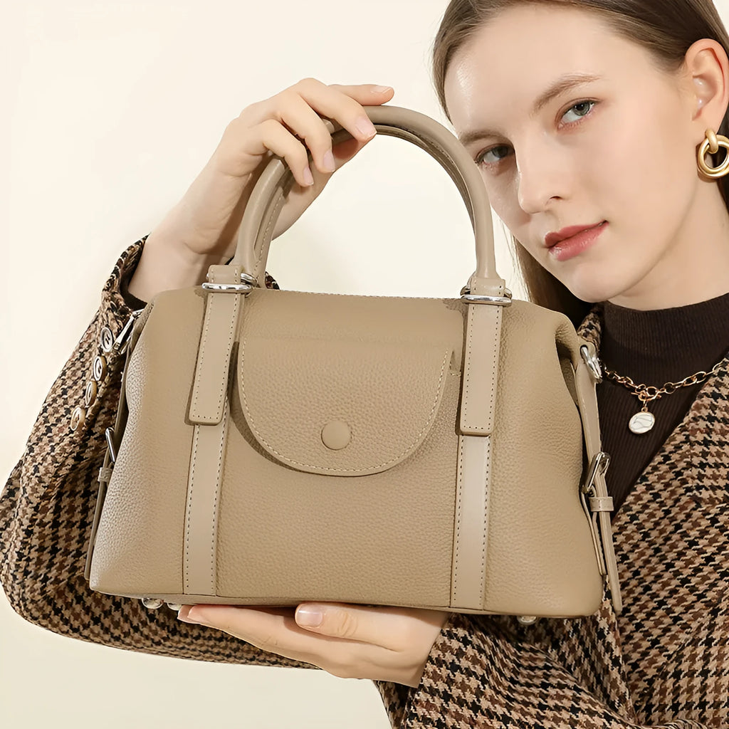 Genuine leather women's handbag in black, grey, or brown with contrast stitching