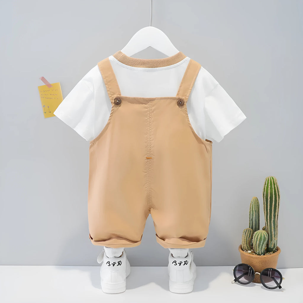 Cotton baby cartoon overalls in khaki with adjustable straps, shown on size chart for 70cm to 110cm.