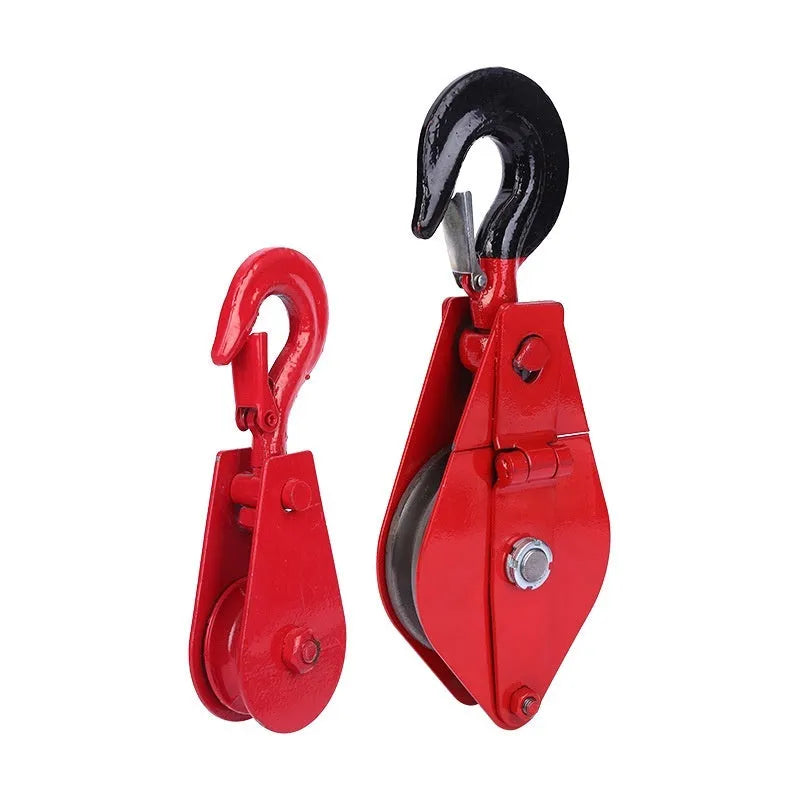 Red industrial lifting pulley with safety latch and forged steel construction for general cargo handling