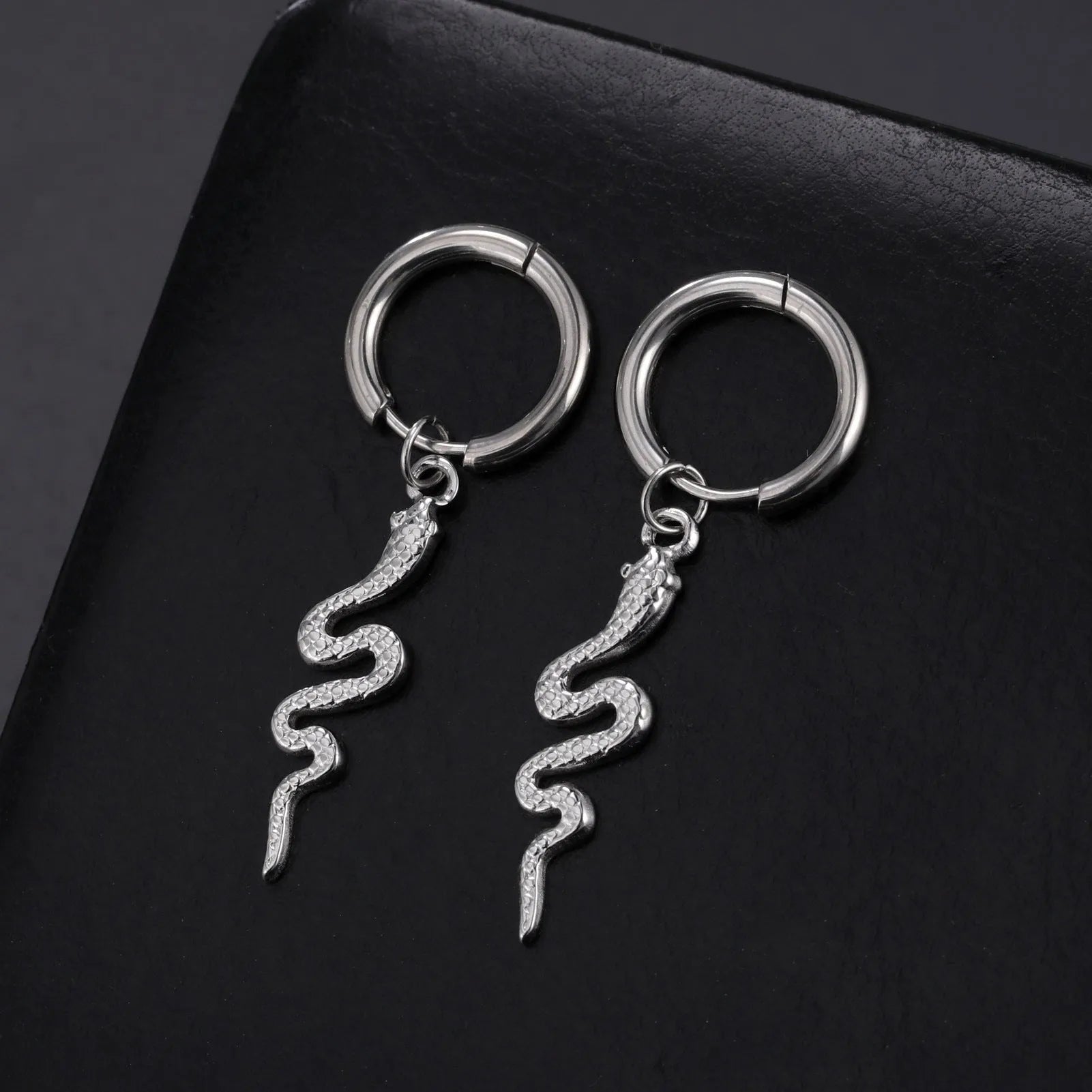Gold plated stainless steel snake-shaped vintage earrings with clip fastenings