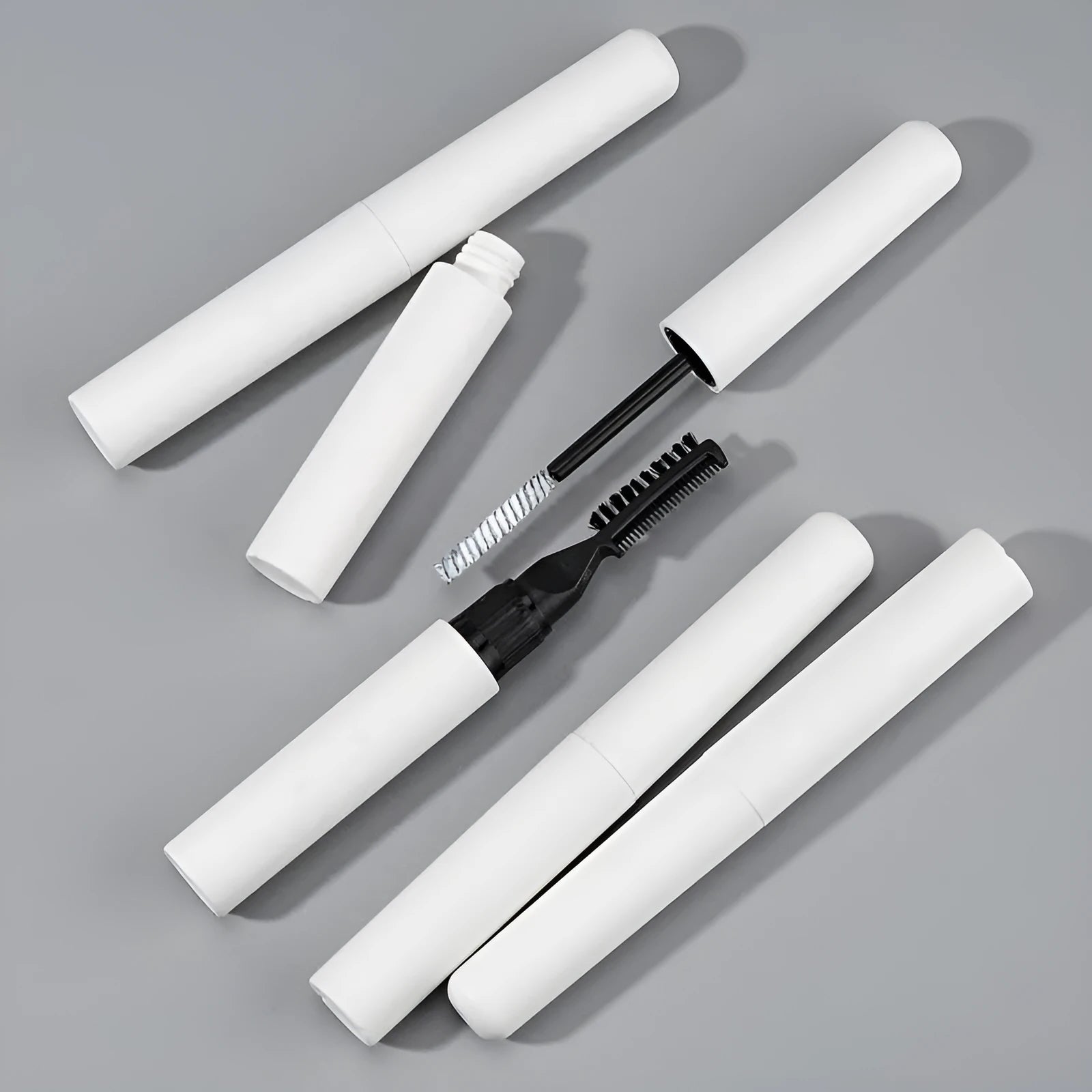One Brush Eyebrow Liquid kit with applicator brush in White or Pink shade options