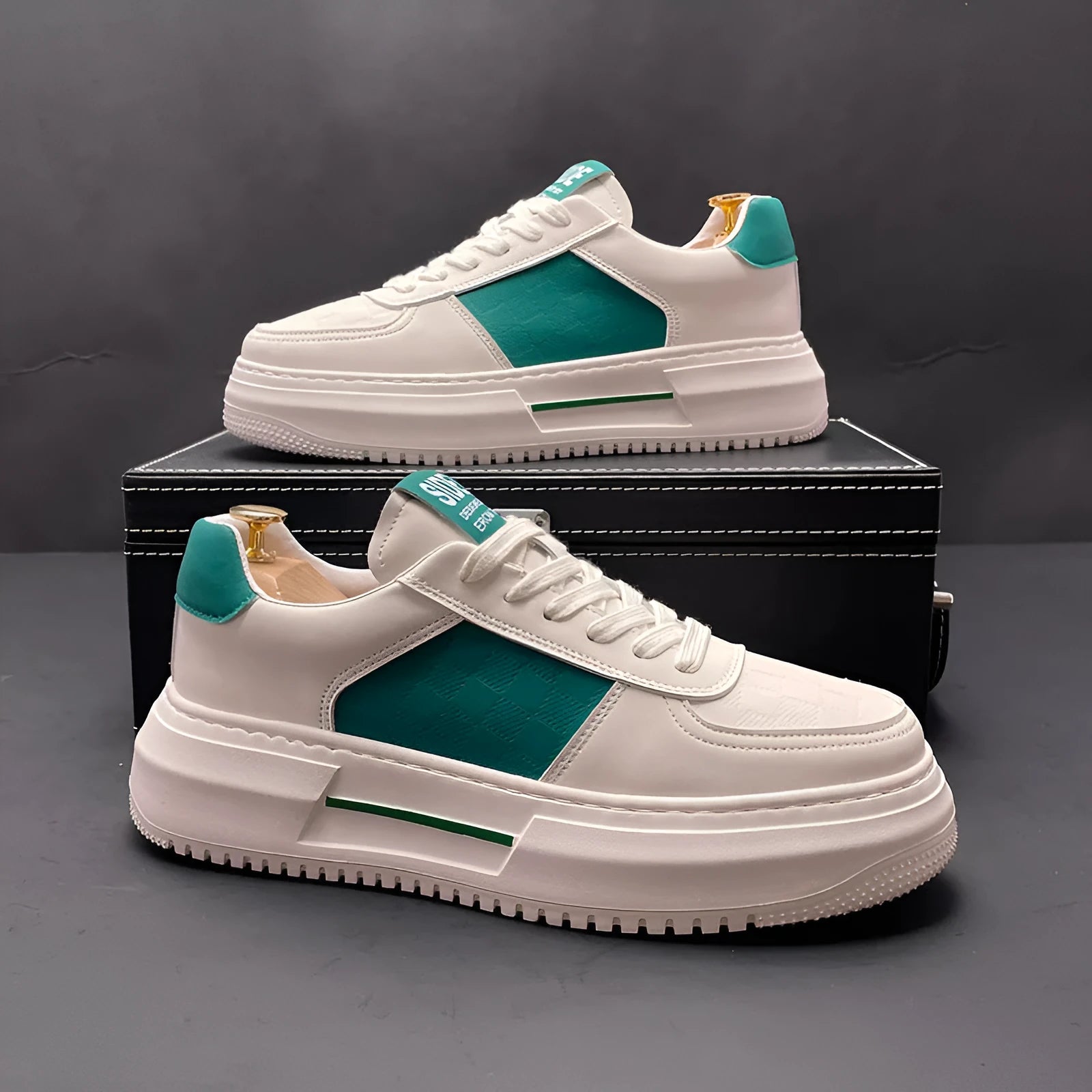 Unisex white sports shoes with cloth upper and rubber foam sole in green and black colour options