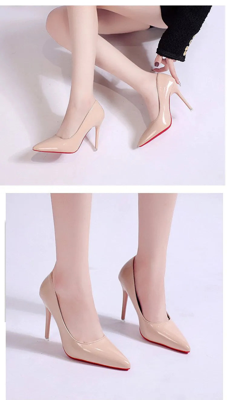 Women's black pointed toe stiletto pump with a shallow cut, shown on a white background.