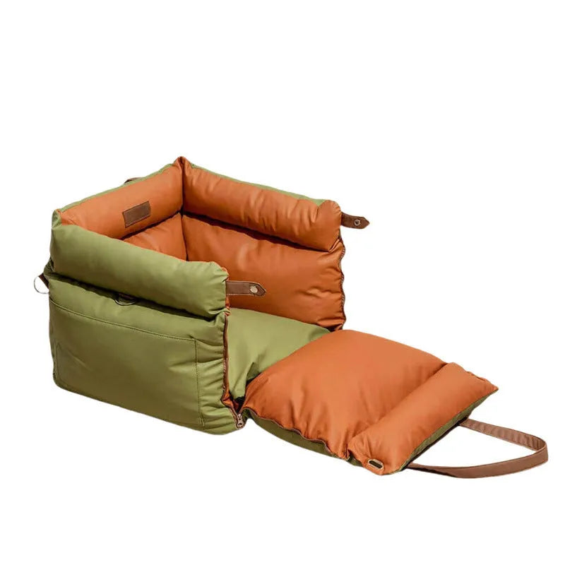 Green waterproof PU leather dog car nest bed with removable inner cushion, shown next to a car seat.