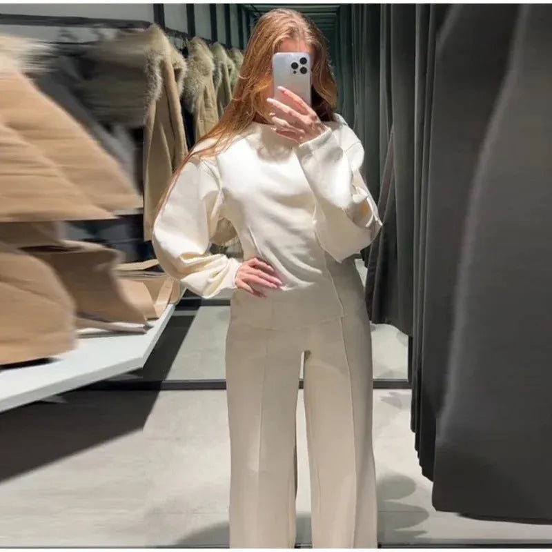 Women's polar fleece two-piece suit set showing O-neck top and wide leg trousers
