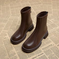 Women's black ankle boots with thick flat heel, round toe and back zipper