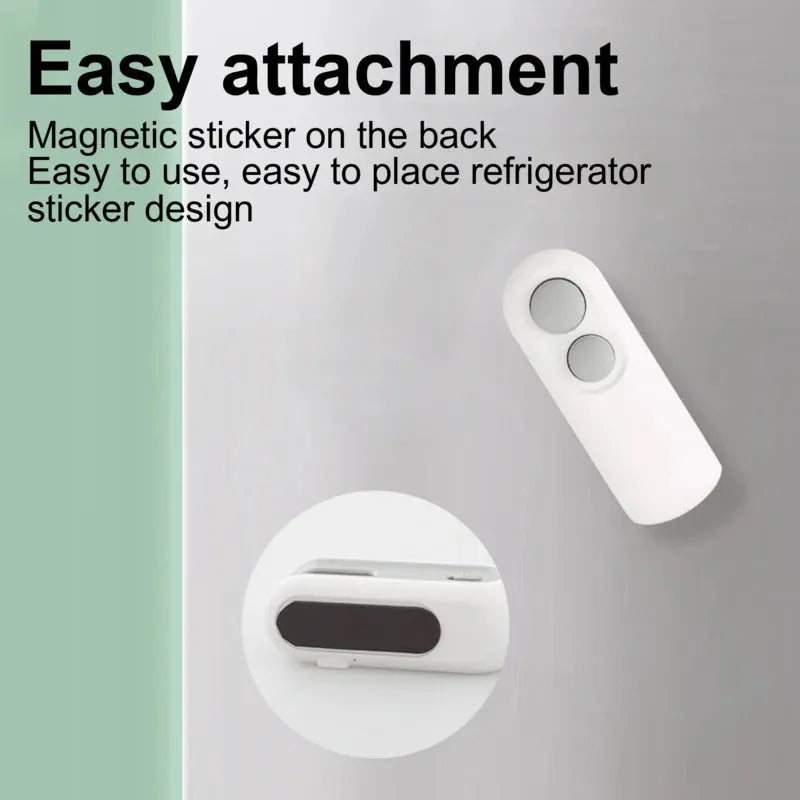 White handheld USB rechargeable heat sealer with cutter blade on a kitchen counter