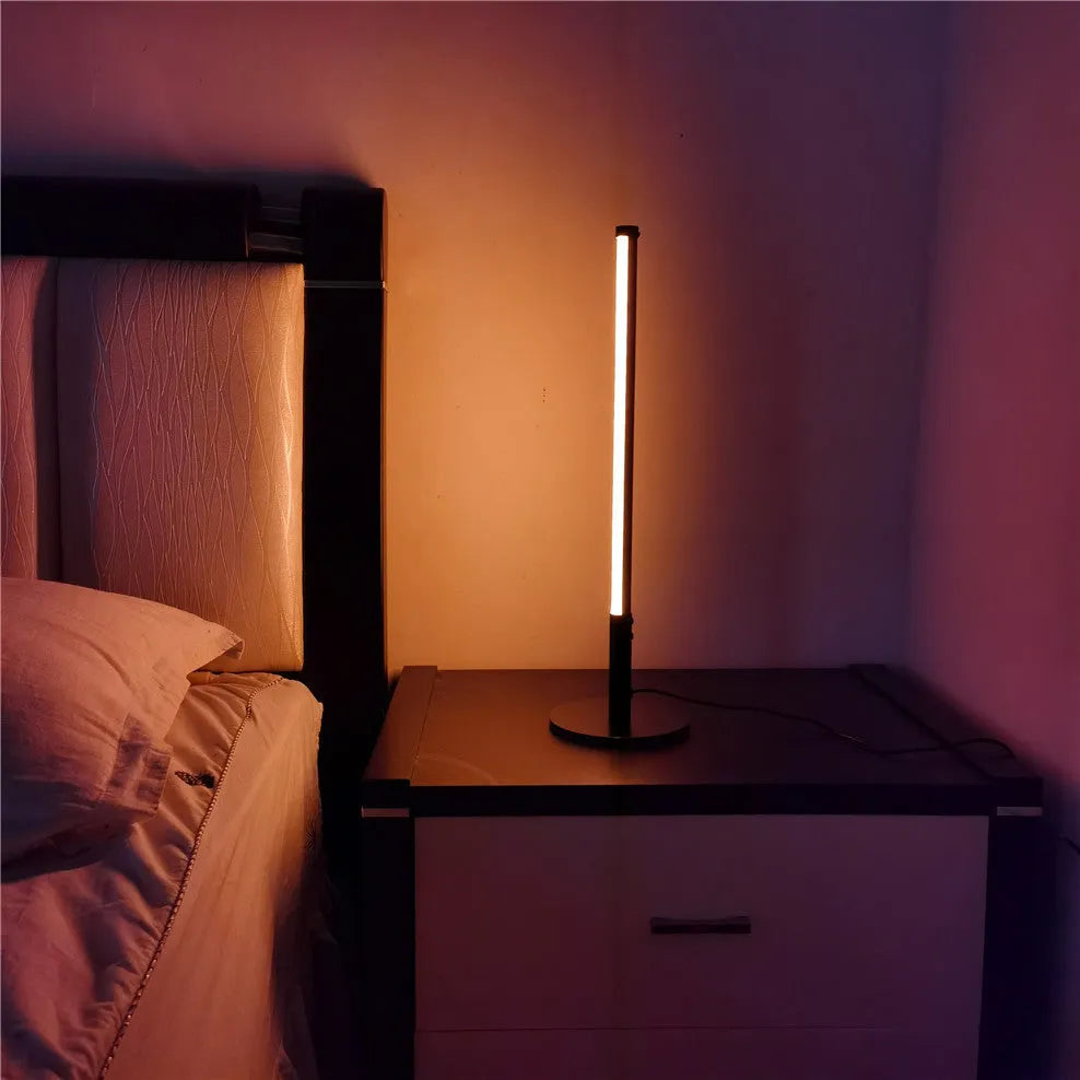 Black retro decorative atmosphere lamp with aluminium alloy body on a side table.