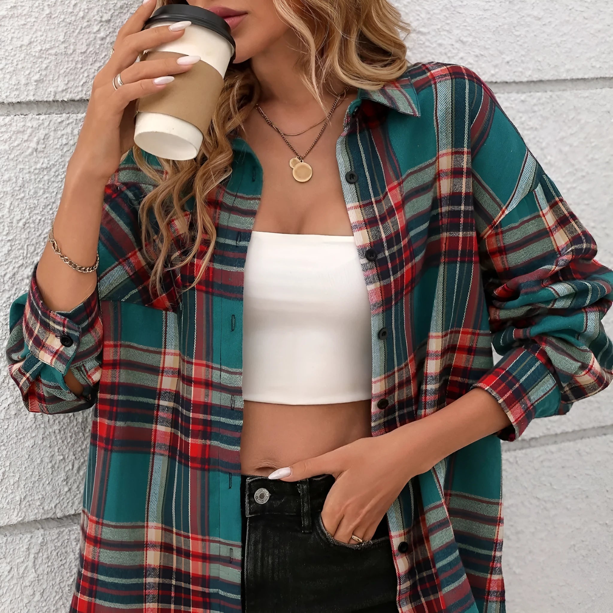Women's loose fitting plaid shirt with long sleeves in black, green, or purple.