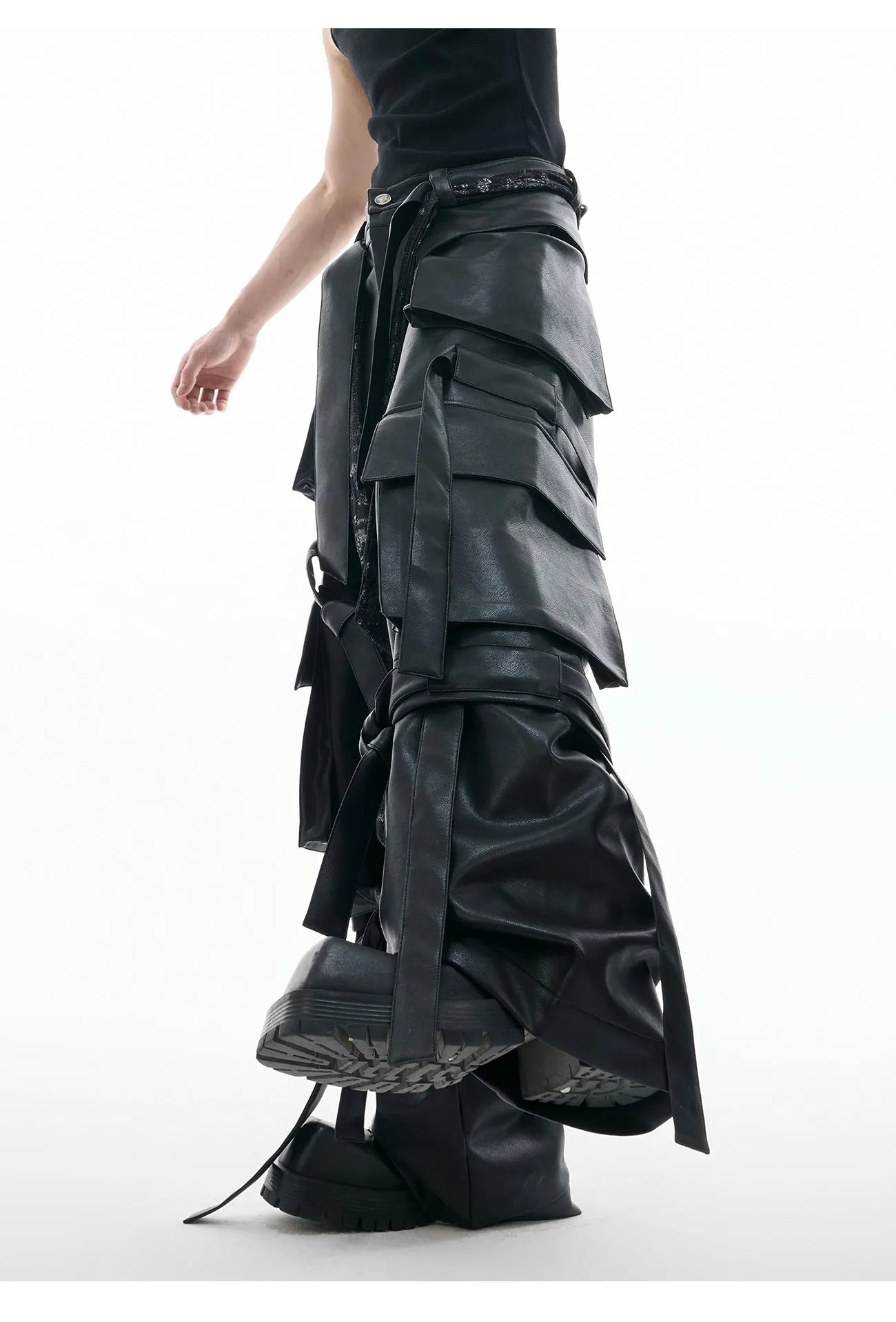 Black loose-fit retro trousers with quilted pattern and multiple stitched pockets.