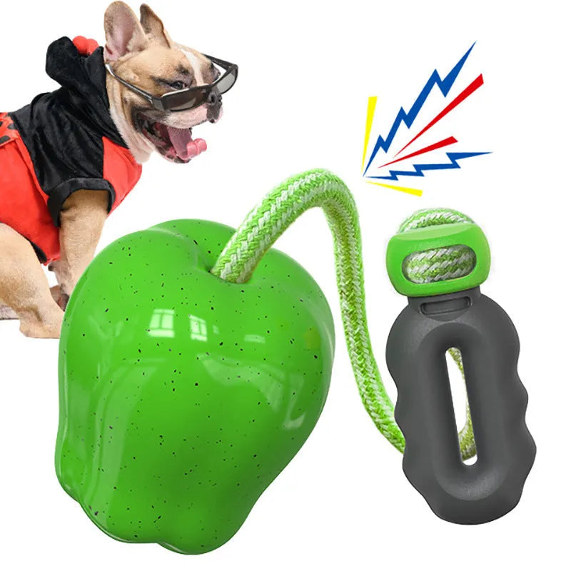 Green and red plastic Apple-shaped dog toys with squeakers for chewing play