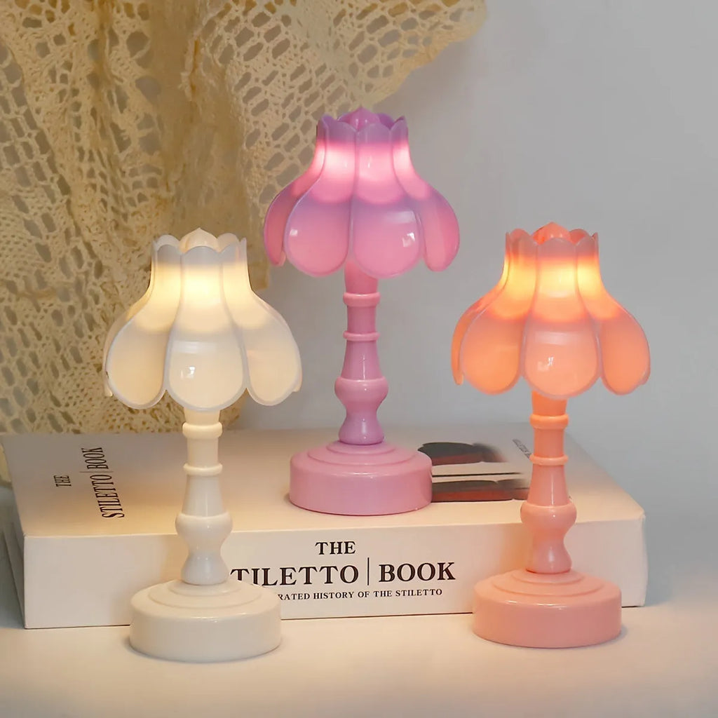 Retro pagoda-shaped small LED night lamp in light purple with geometric stereo design