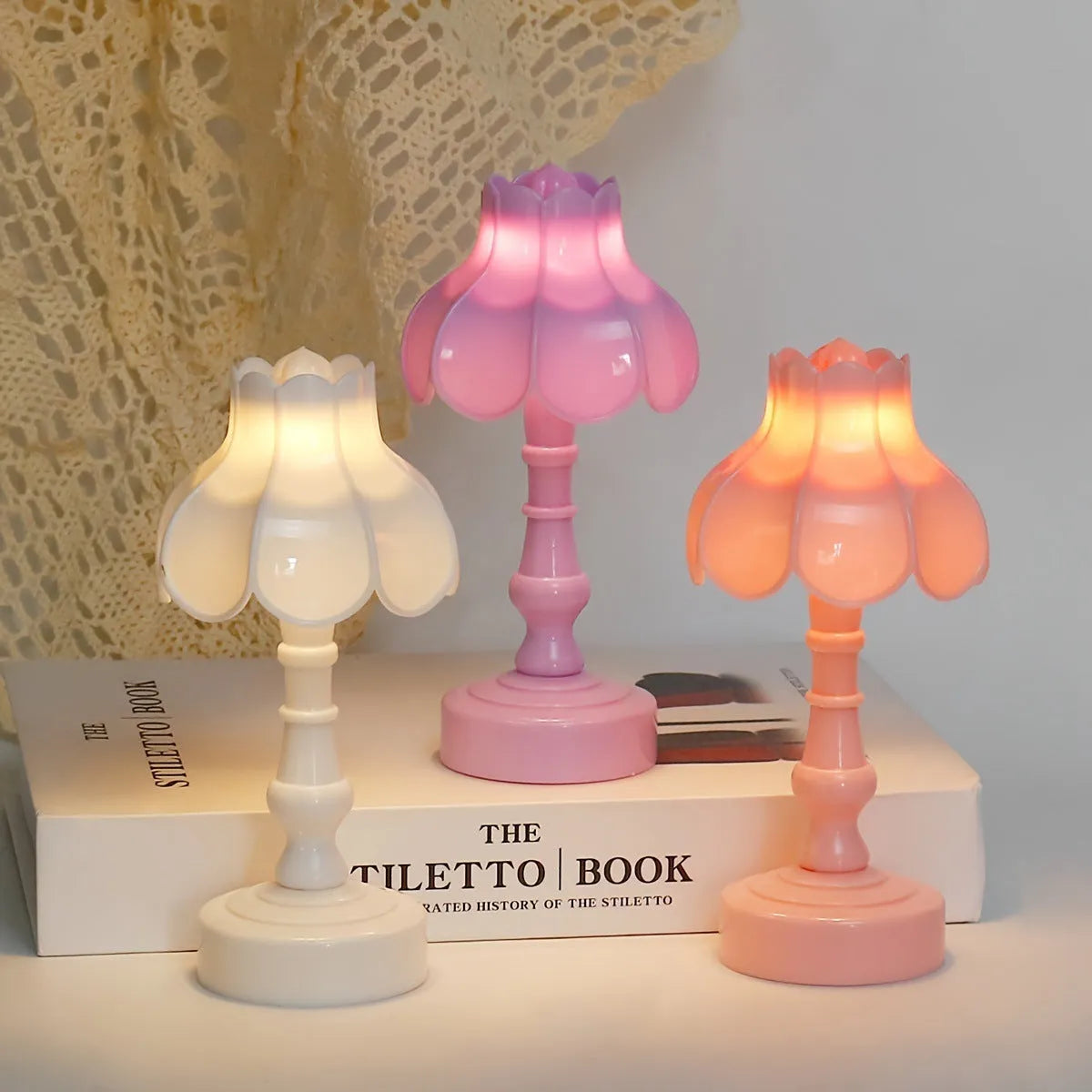 Retro pagoda-shaped small LED night lamp in light purple with geometric stereo design