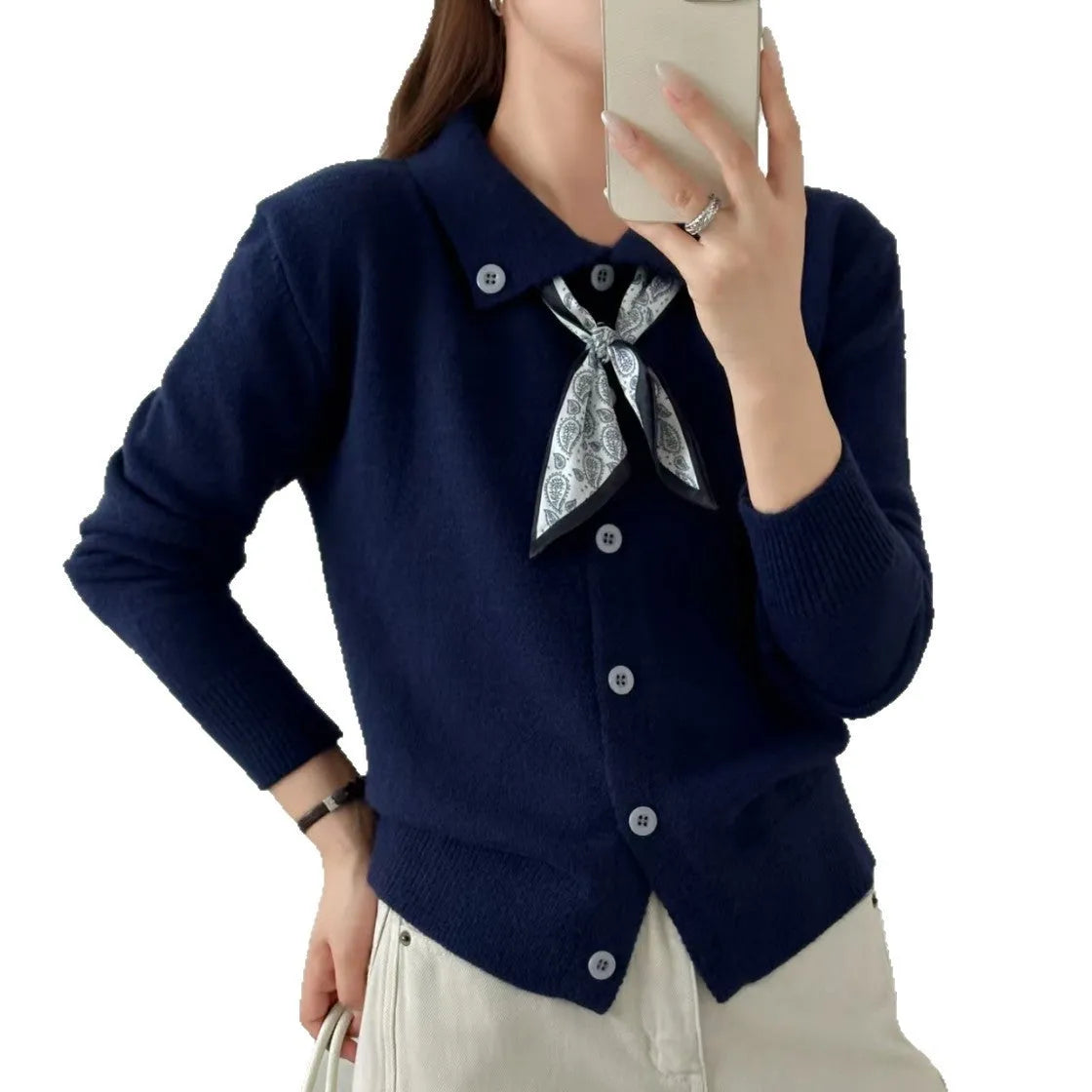 Women's beige cardigan sweater with a built-in lapel scarf collar and long sleeves.