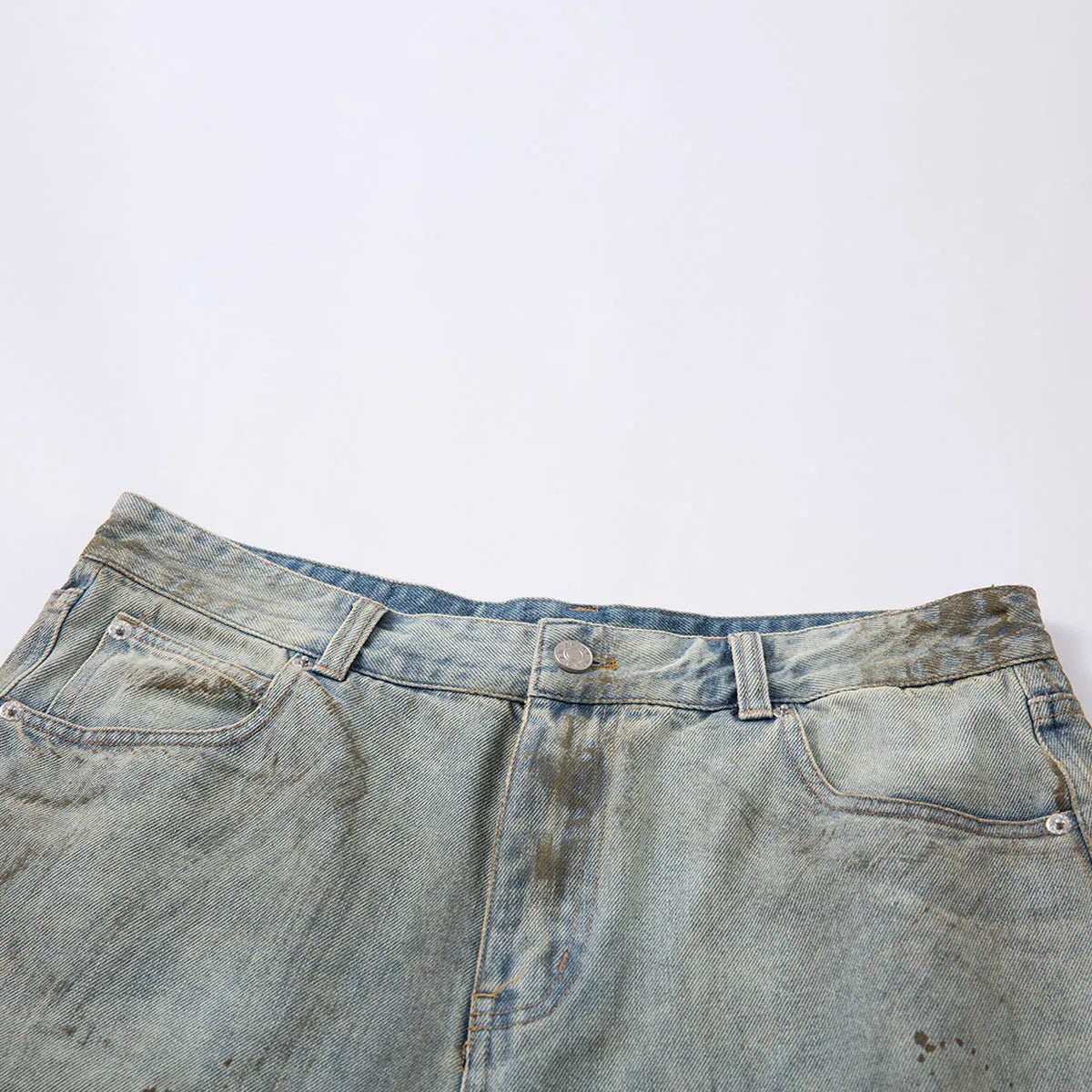Women's blue cropped washed denim straight-leg trousers with zipper fly on hanger