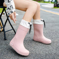 Women's PVC rain boot in solid colour with non-slip sole