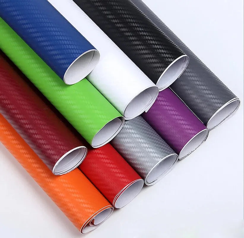 Roll of 3D carbon fiber car decoration sticker showing textured surface in multiple colour options