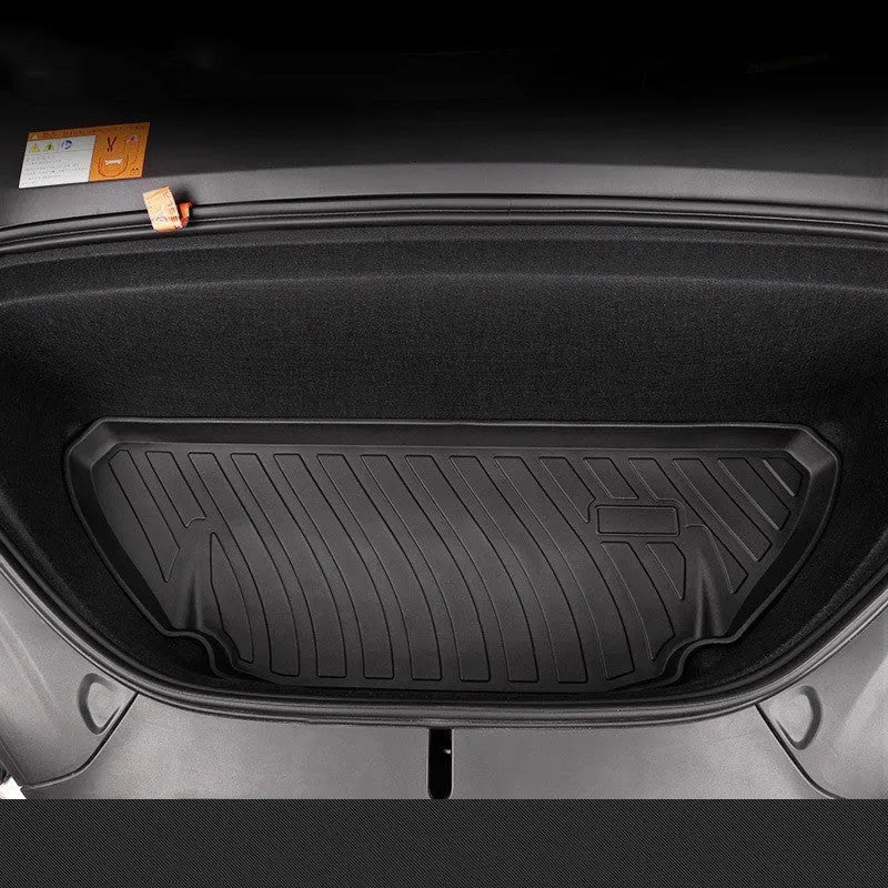 Set of black rubber floor mats for a Tesla car interior