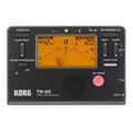TM-60 digital metronome in black or white plastic shell with display and controls.