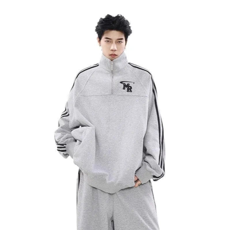 Black Hong Kong style retro sports hoodie with stand collar and long sleeves.