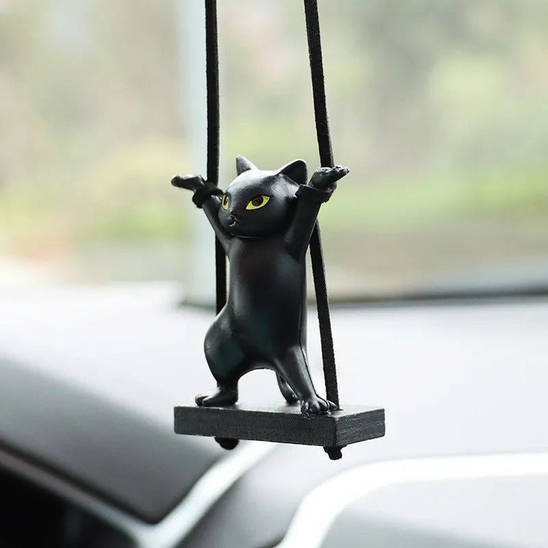 Cartoon-style resin cat pendant on a 25cm rope for hanging from a car rear-view mirror.