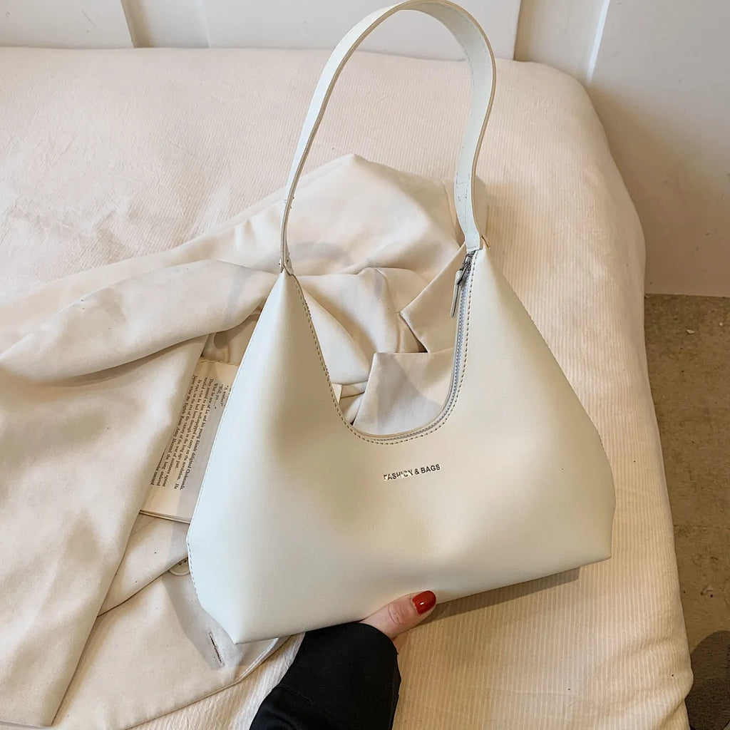 French European retro PU shoulder handbag in pillow shape with letter stitch detail, four colour options