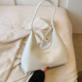 French European retro PU shoulder handbag in pillow shape with letter stitch detail, four colour options