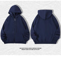 Men's beige heavyweight zip-up hooded cardigan sweater with top-stitch pockets, shown in a loose fit.