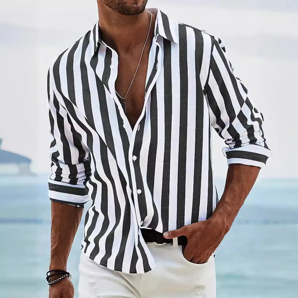 Man wearing a light grey and black striped loose-fit long sleeve casual shirt, British cardigan style.